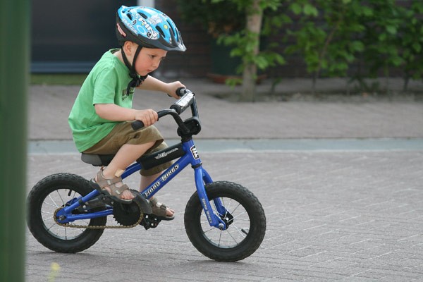 little kid riding bike