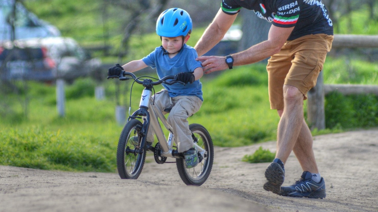 a kid riding a bike
