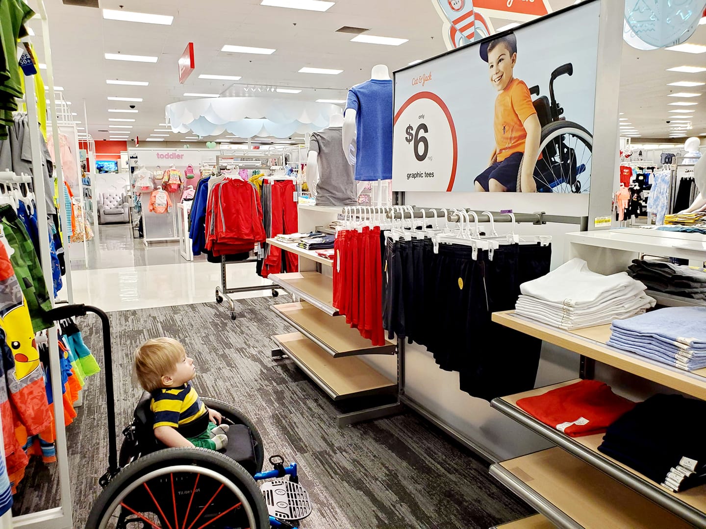 Toddler Looking At Target Ad Featuring Boy In Wheelchair Shows The Importance Of Inclusion - roblox wheelchair accessory