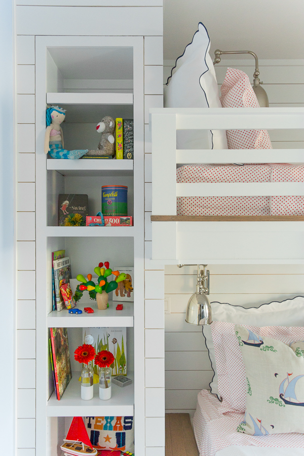 2 bunk beds in small room
